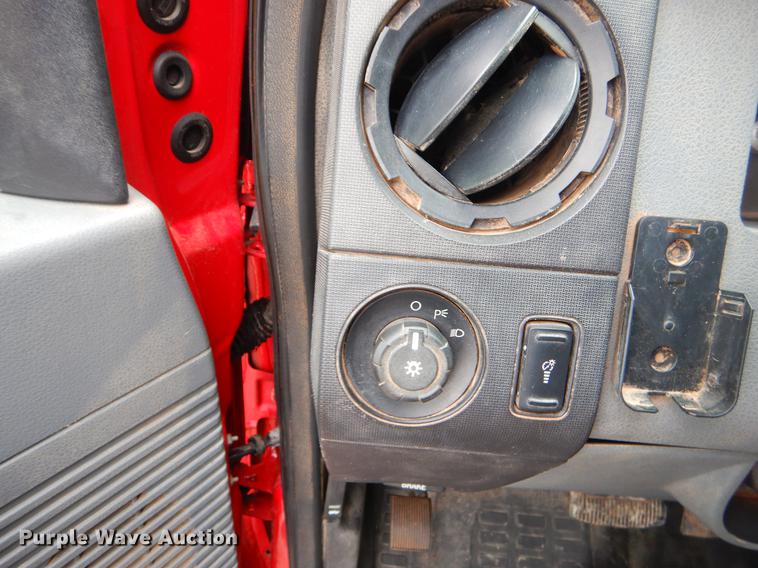 image for item FQ9707 2011 Ford F450 Super Duty Crew Cab flatbed truck with crane