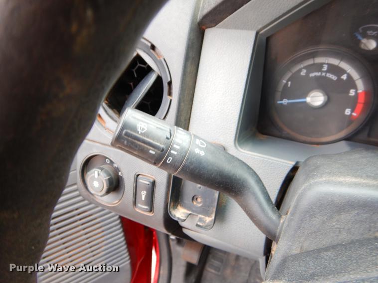 image for item FQ9707 2011 Ford F450 Super Duty Crew Cab flatbed truck with crane