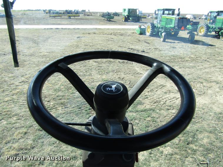 image for item DB6780 2011 John Deere R450 windrower
