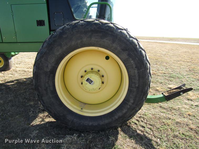 image for item DB6780 2011 John Deere R450 windrower