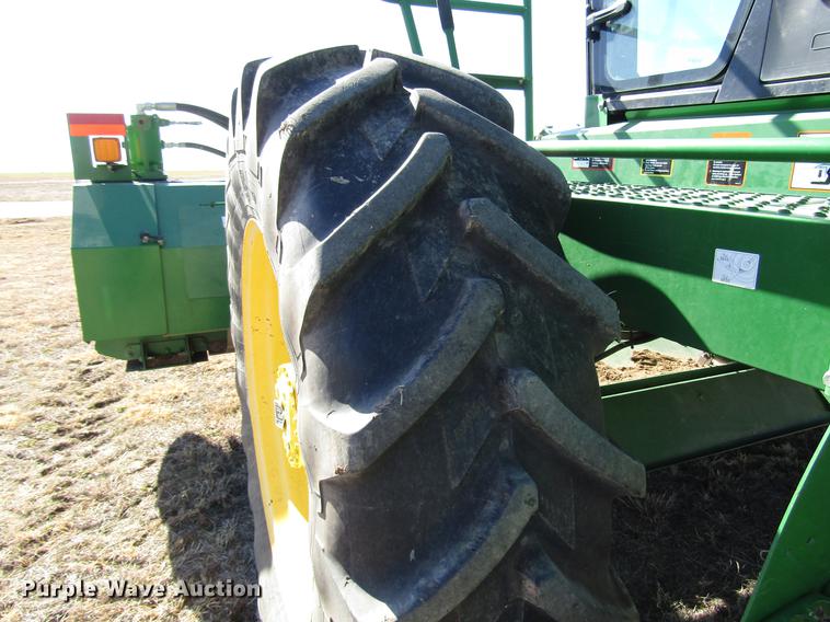 image for item DB6781 2013 John Deere R450 windrower