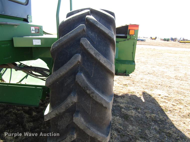 image for item DB6781 2013 John Deere R450 windrower