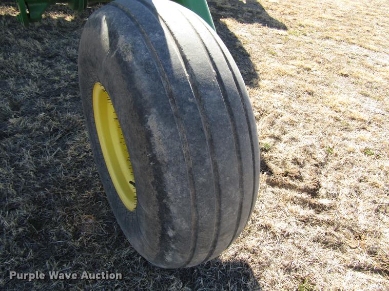 image for item DB6781 2013 John Deere R450 windrower
