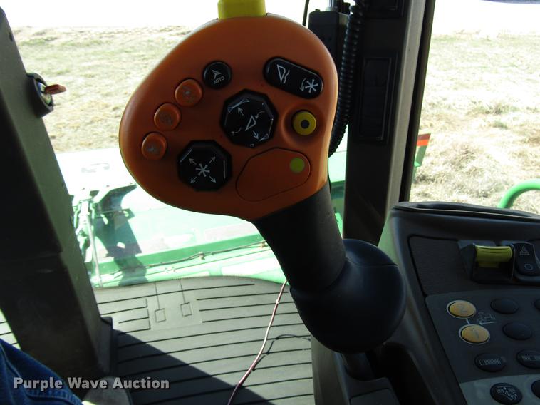 image for item DB6782 2012 John Deere R450 windrower