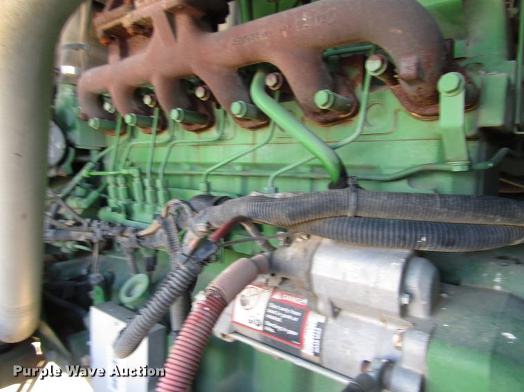 image for item DB6782 2012 John Deere R450 windrower