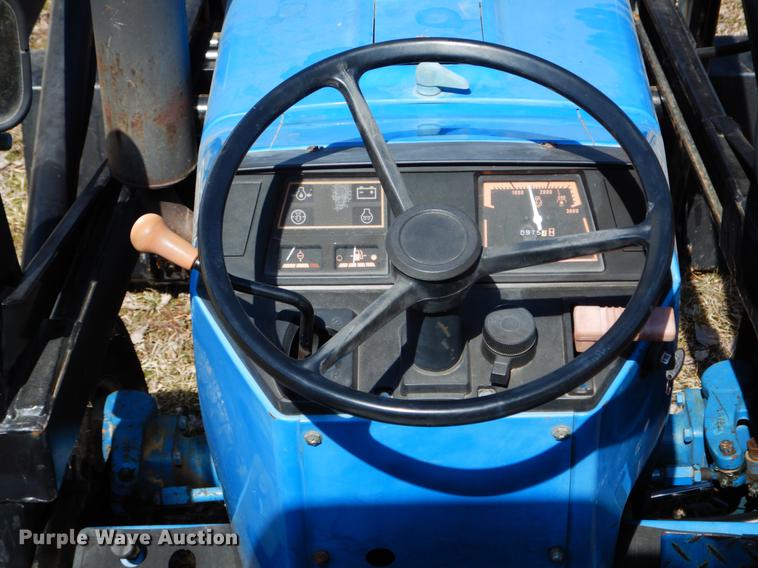 image for item DE6061 1990 Ford 1520 MFWD tractor