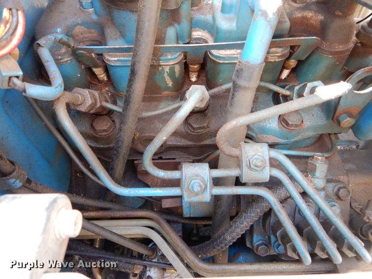 image for item DE6061 1990 Ford 1520 MFWD tractor