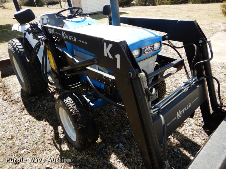 image for item DE6061 1990 Ford 1520 MFWD tractor