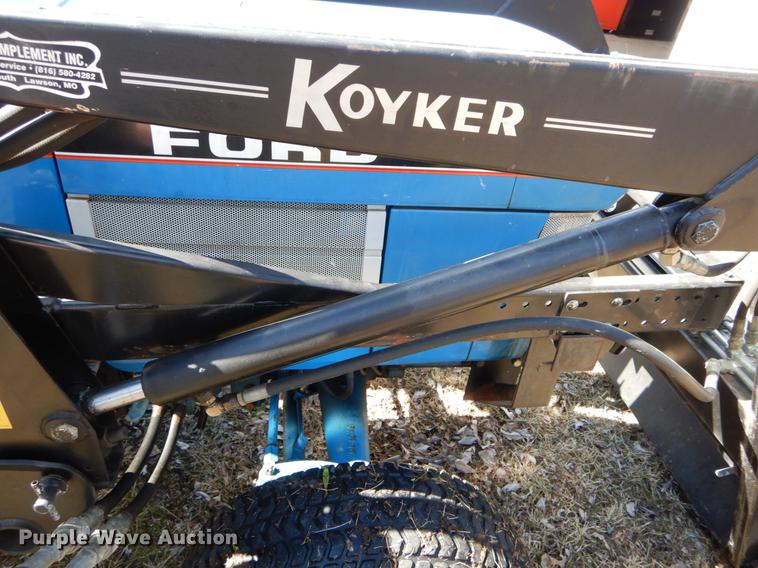 image for item DE6061 1990 Ford 1520 MFWD tractor