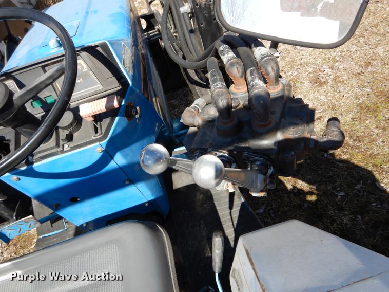 image for item DE6061 1990 Ford 1520 MFWD tractor