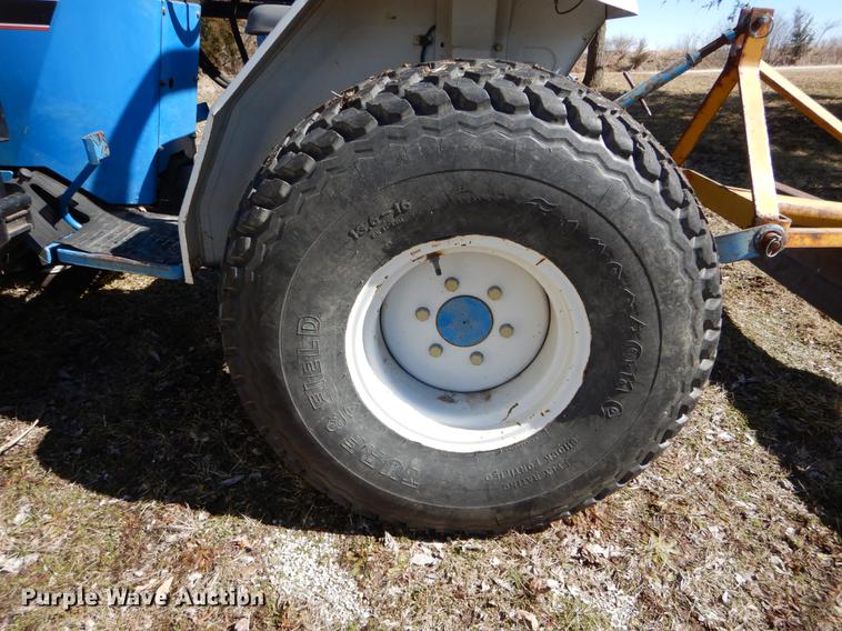 image for item DE6061 1990 Ford 1520 MFWD tractor