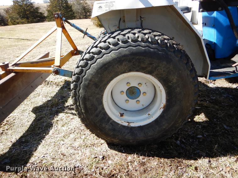 image for item DE6061 1990 Ford 1520 MFWD tractor