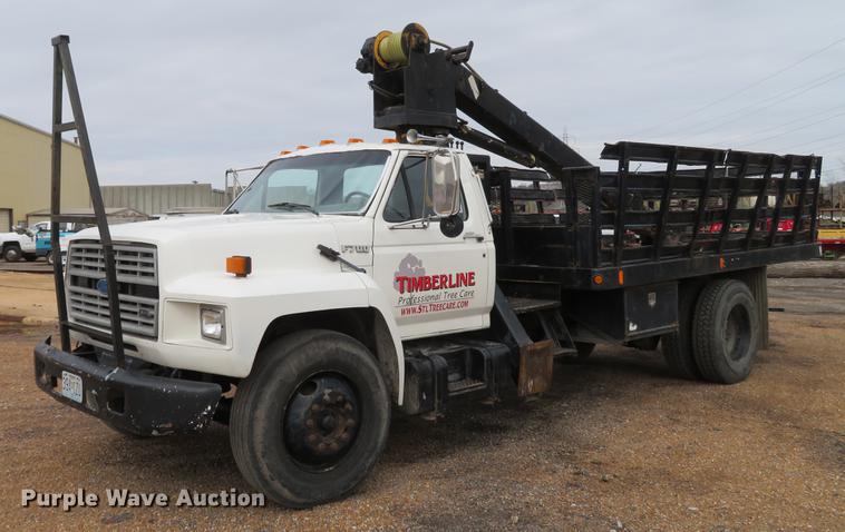 image for item DG3898 1992 Ford F700 flatbed truck with crane