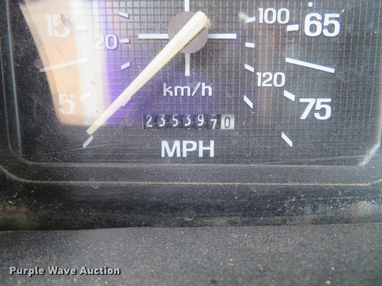 image for item DG3898 1992 Ford F700 flatbed truck with crane