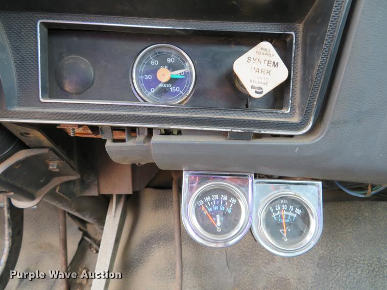 image for item DG3898 1992 Ford F700 flatbed truck with crane