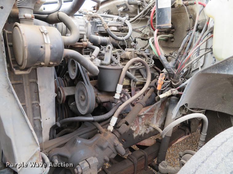 image for item DG3898 1992 Ford F700 flatbed truck with crane