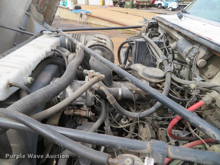 image for item DG3898 1992 Ford F700 flatbed truck with crane