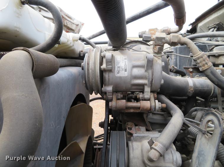 image for item DG3898 1992 Ford F700 flatbed truck with crane