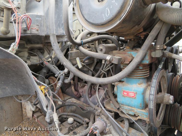 image for item DG3898 1992 Ford F700 flatbed truck with crane