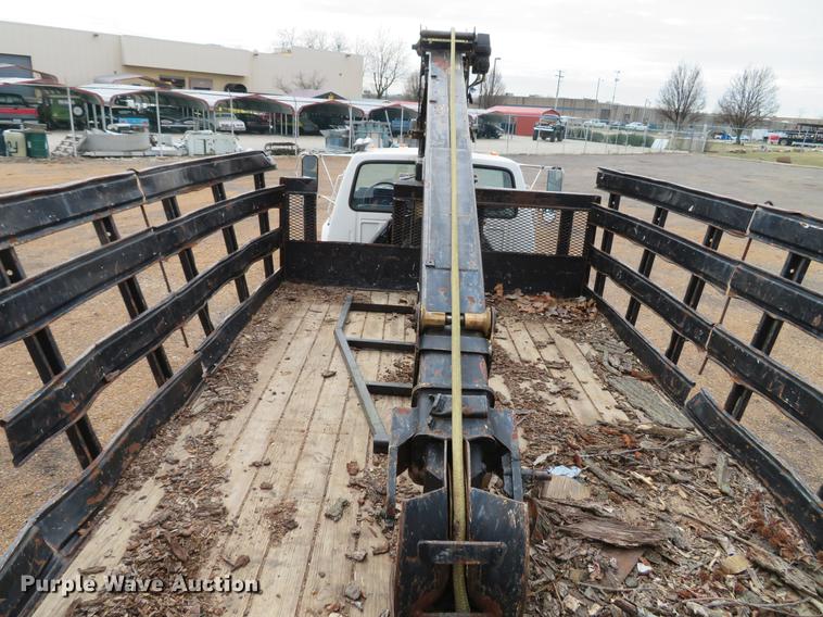 image for item DG3898 1992 Ford F700 flatbed truck with crane