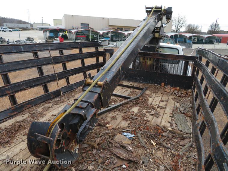 image for item DG3898 1992 Ford F700 flatbed truck with crane