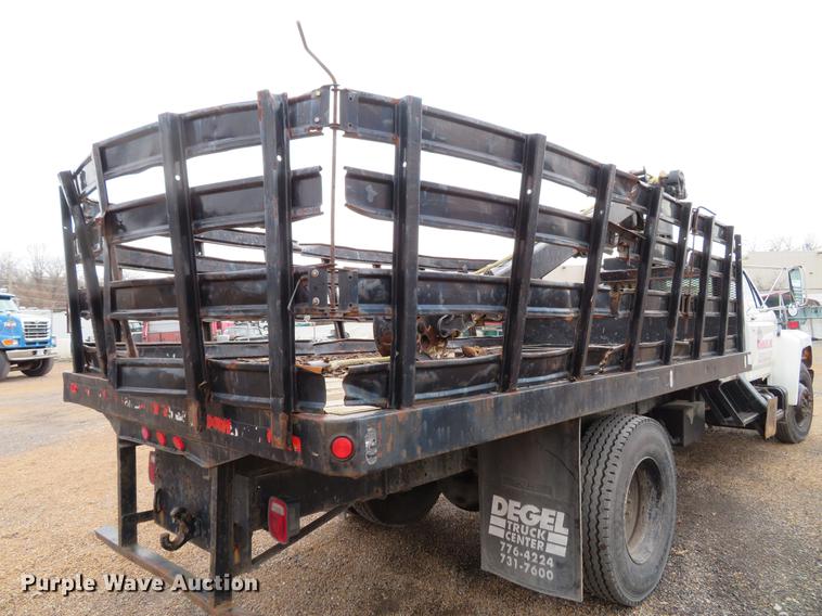 image for item DG3898 1992 Ford F700 flatbed truck with crane