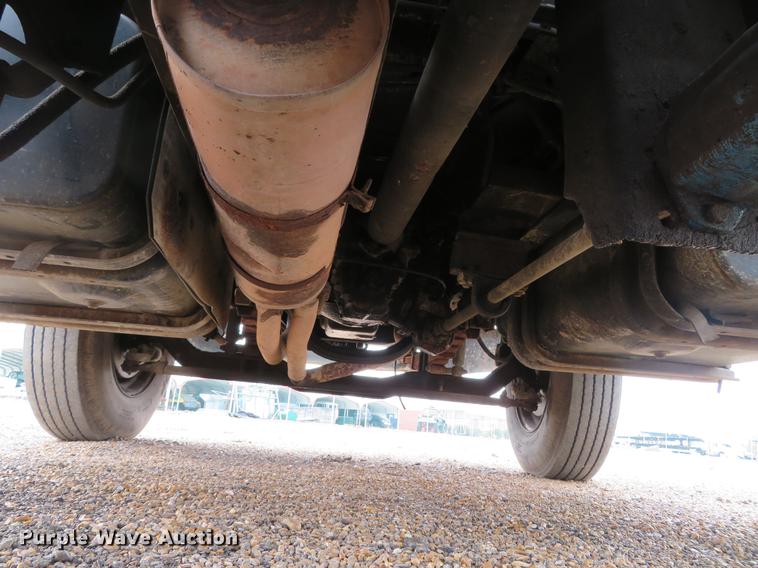 image for item DG3898 1992 Ford F700 flatbed truck with crane