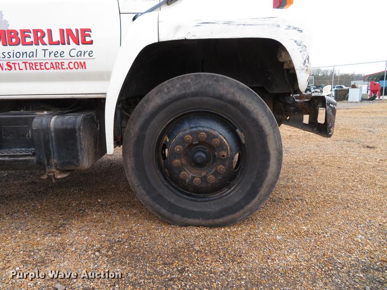 image for item DG3898 1992 Ford F700 flatbed truck with crane