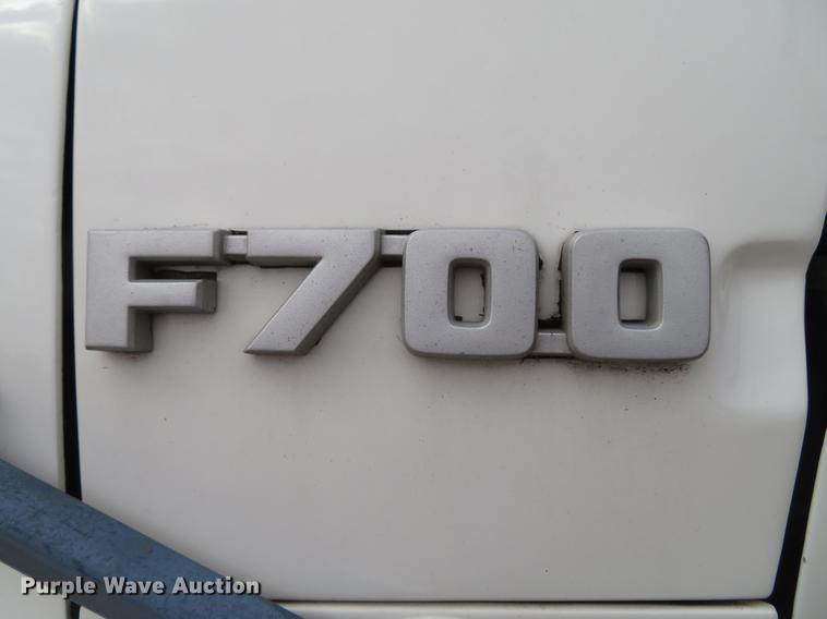 image for item DG3898 1992 Ford F700 flatbed truck with crane