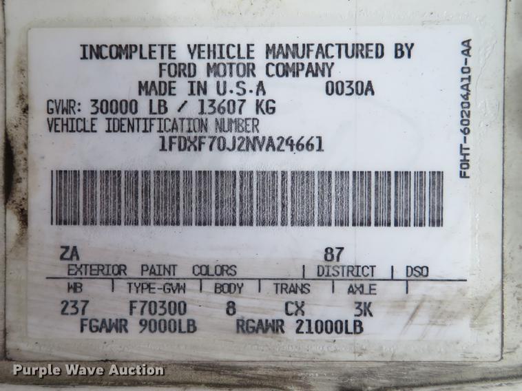 image for item DG3898 1992 Ford F700 flatbed truck with crane