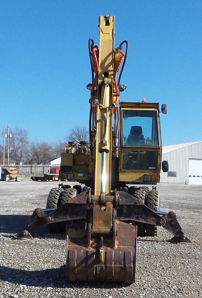 image for item EW9985 1985 Caterpillar 206 rubber tire excavator