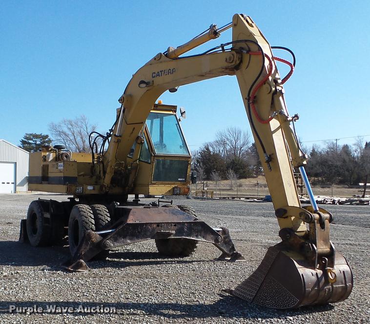 image for item EW9985 1985 Caterpillar 206 rubber tire excavator