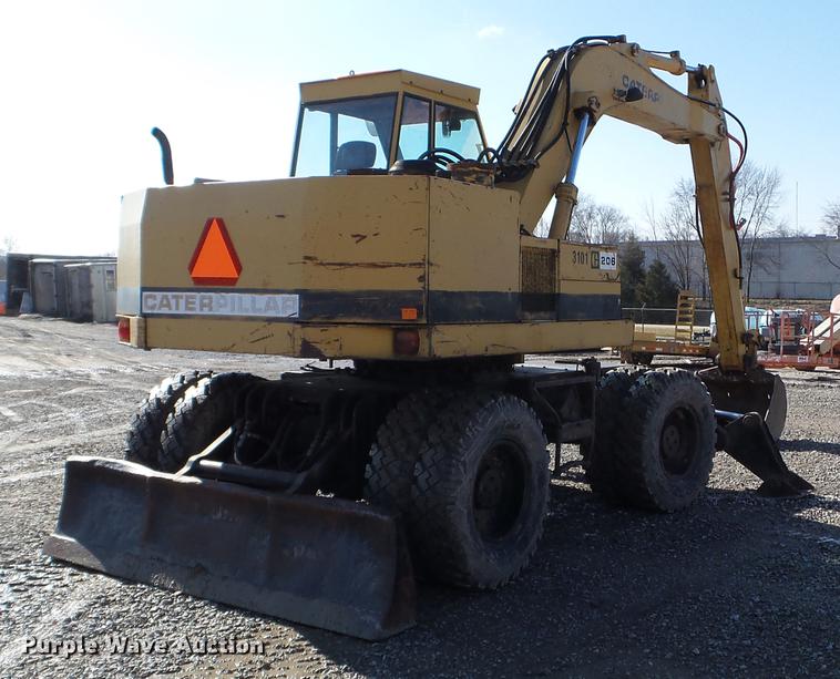image for item EW9985 1985 Caterpillar 206 rubber tire excavator
