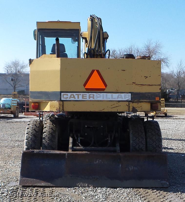 image for item EW9985 1985 Caterpillar 206 rubber tire excavator