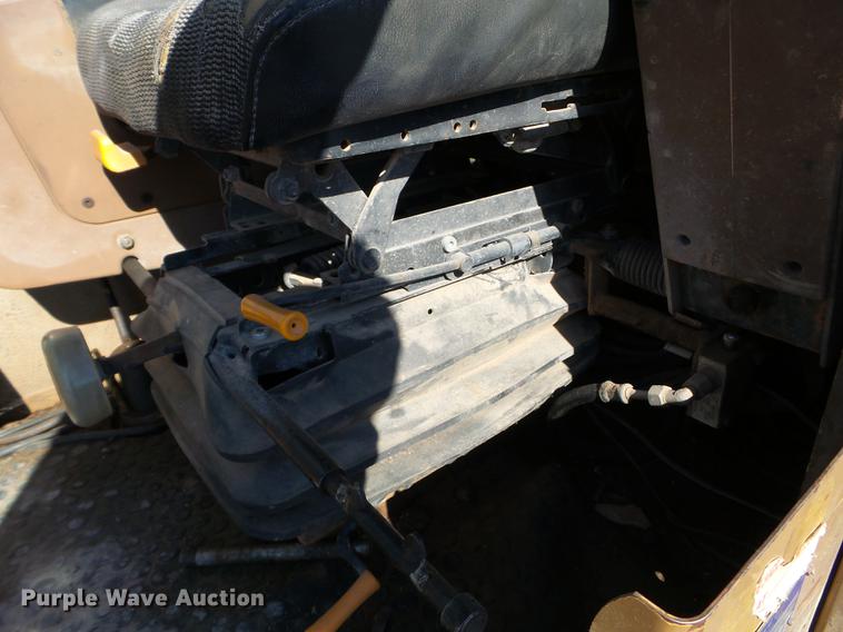 image for item EW9985 1985 Caterpillar 206 rubber tire excavator