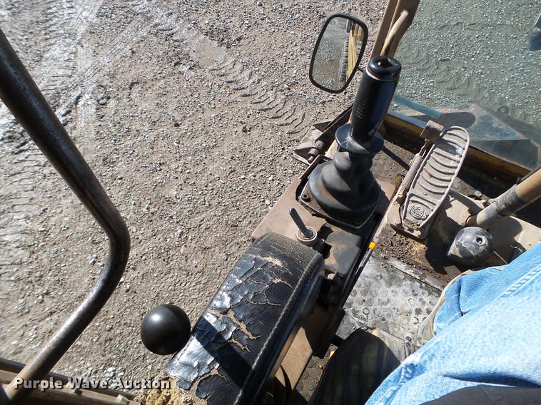 image for item EW9985 1985 Caterpillar 206 rubber tire excavator