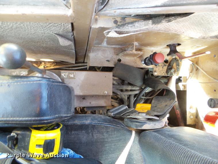 image for item EW9985 1985 Caterpillar 206 rubber tire excavator