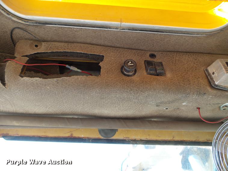 image for item EW9985 1985 Caterpillar 206 rubber tire excavator