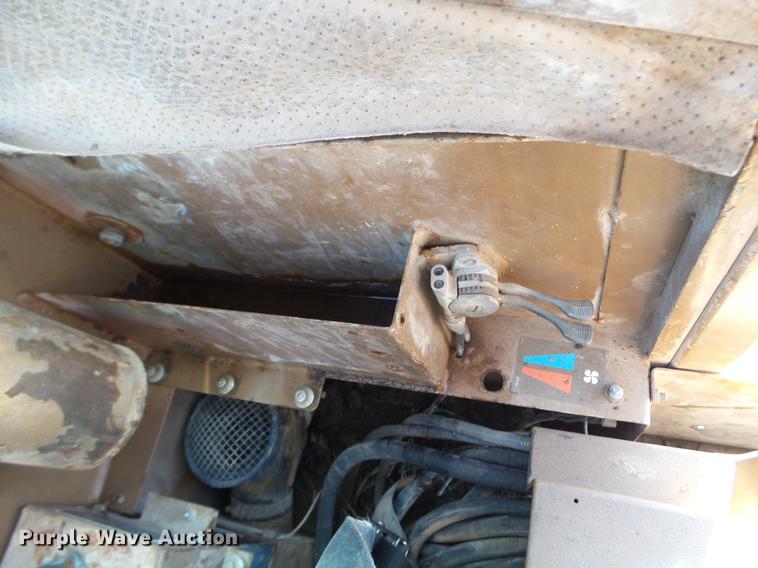 image for item EW9985 1985 Caterpillar 206 rubber tire excavator