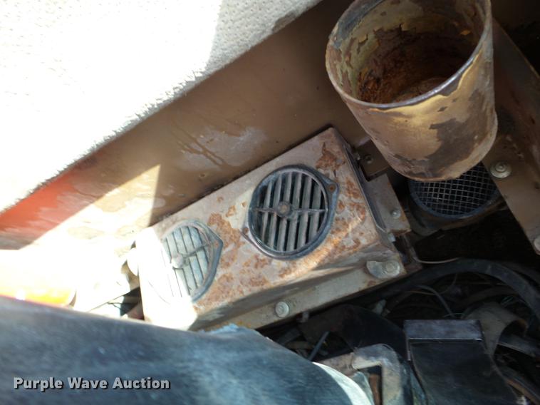 image for item EW9985 1985 Caterpillar 206 rubber tire excavator