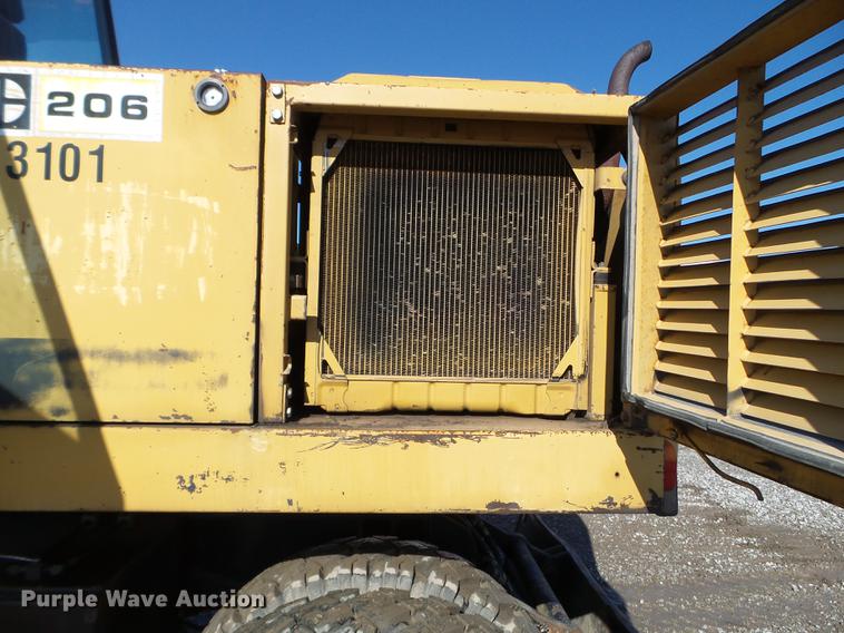 image for item EW9985 1985 Caterpillar 206 rubber tire excavator