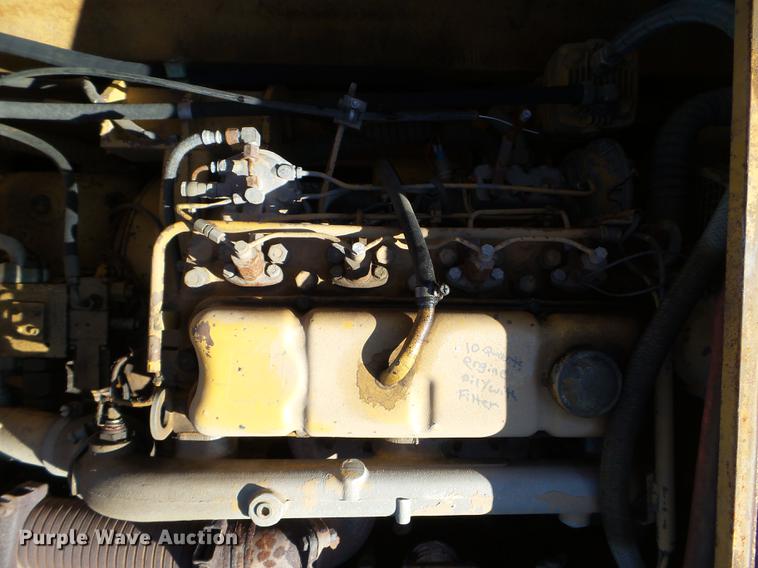 image for item EW9985 1985 Caterpillar 206 rubber tire excavator