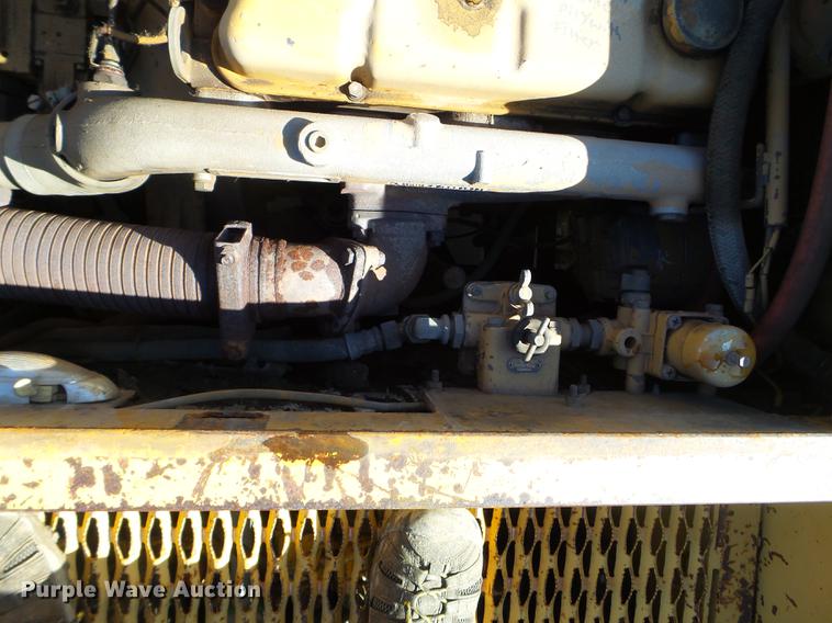 image for item EW9985 1985 Caterpillar 206 rubber tire excavator