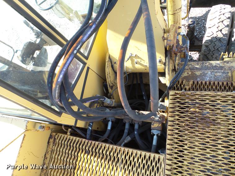 image for item EW9985 1985 Caterpillar 206 rubber tire excavator