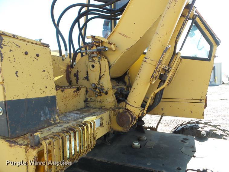 image for item EW9985 1985 Caterpillar 206 rubber tire excavator