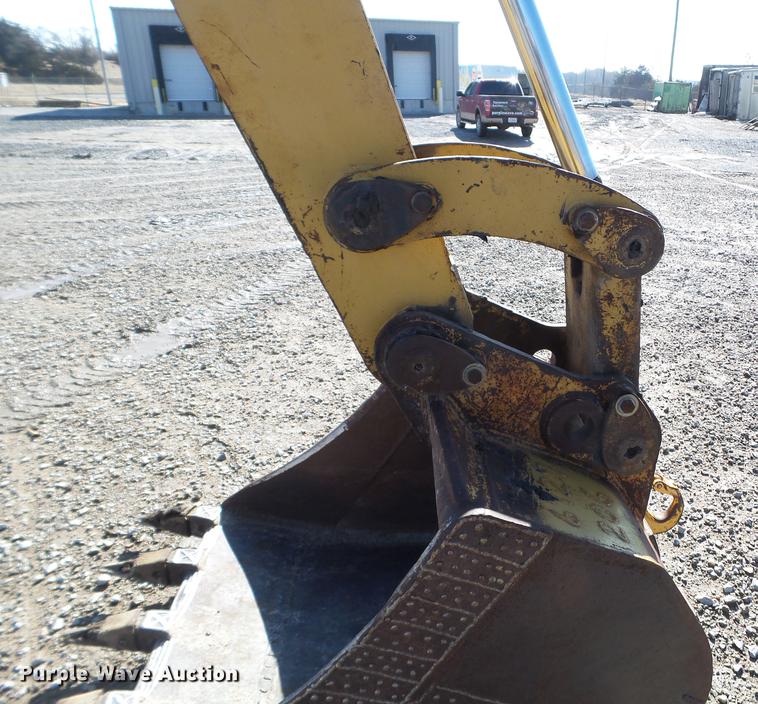 image for item EW9985 1985 Caterpillar 206 rubber tire excavator