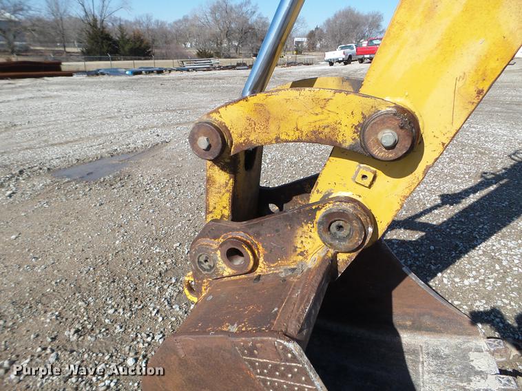 image for item EW9985 1985 Caterpillar 206 rubber tire excavator