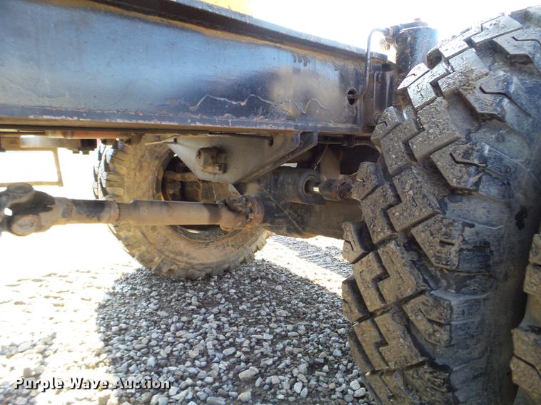 image for item EW9985 1985 Caterpillar 206 rubber tire excavator