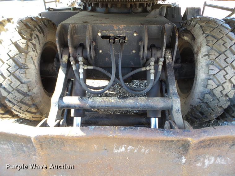 image for item EW9985 1985 Caterpillar 206 rubber tire excavator