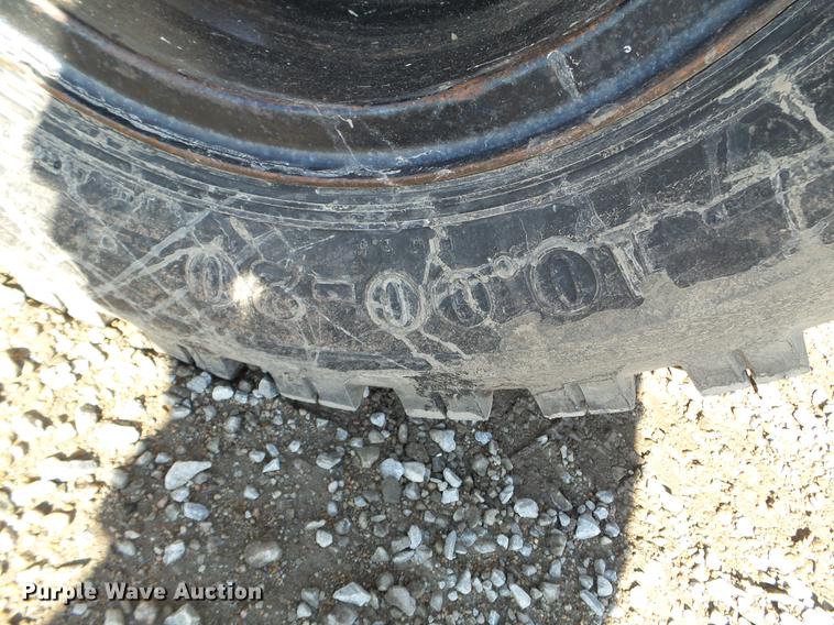 image for item EW9985 1985 Caterpillar 206 rubber tire excavator